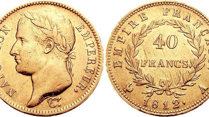 Golden coin minted under the First Empire and presenting the Laureate head of Napoleon I.